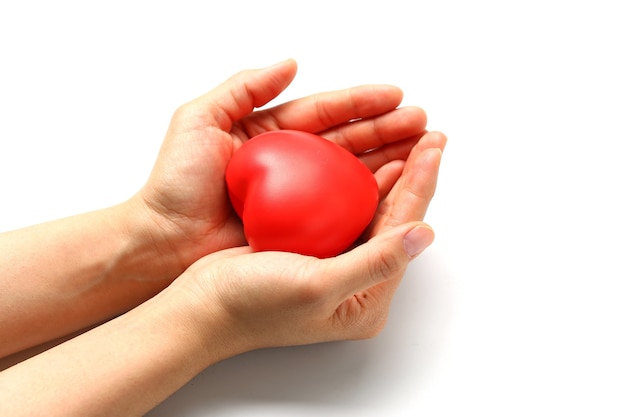 Red heart in hands