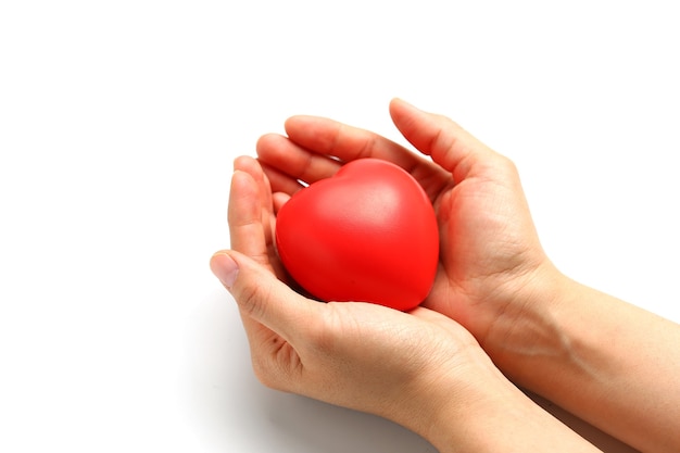 Red heart in hands