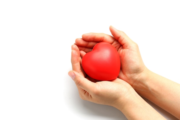 Photo red heart in hands