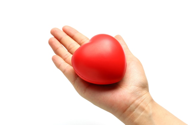 Red heart in hands