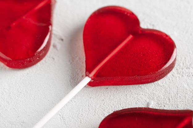 Red heart lollipop. Candy.