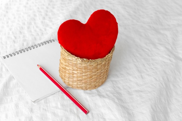 Red heart and notebook