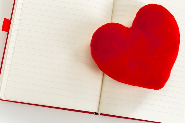 Red heart and notebook