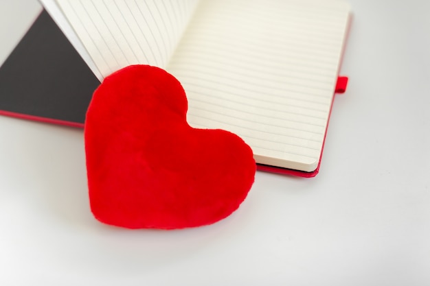 Red heart and notebook