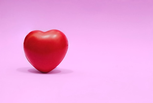 Red heart on pink background, concept, love, Valentine