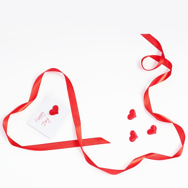 Red heart of ribbon. Valentines day greeting card.