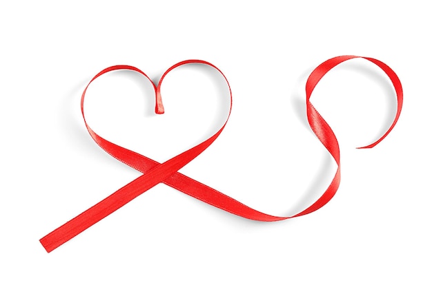 Red heart shaped ribbon isolated on white