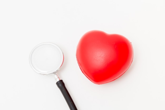 Red heart and a stethoscope. 