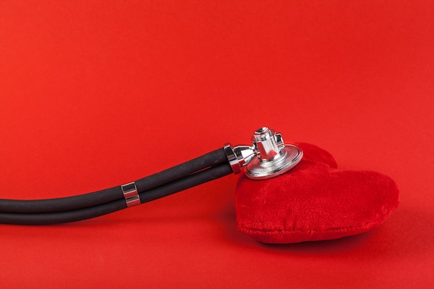 Red heart and a stethoscope