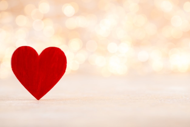 Red heart, valentine day greeting card. Bokeh background.