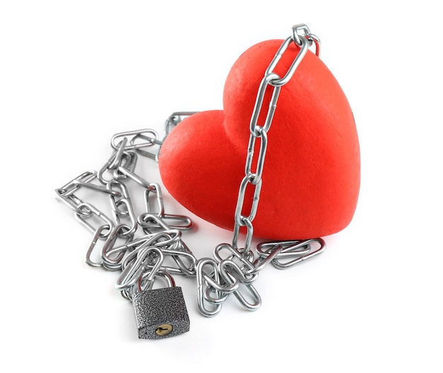 Red heart with metal chain isolated on white