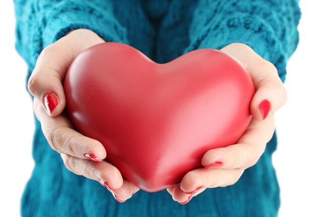 Photo red heart in woman hands, close up