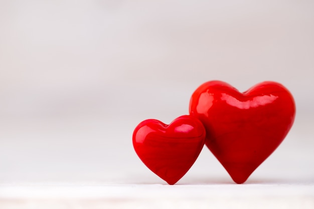 Red hearts the bokeh background. Valentine Day background.