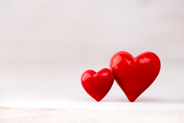 Red hearts the bokeh background. Valentine Day background.