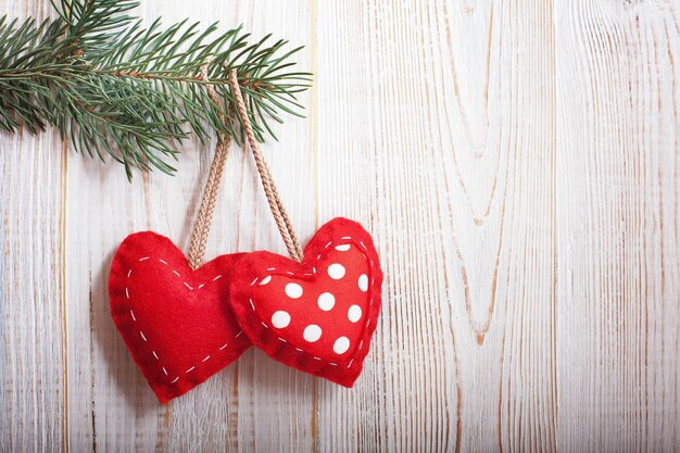 red hearts and Christmas branch