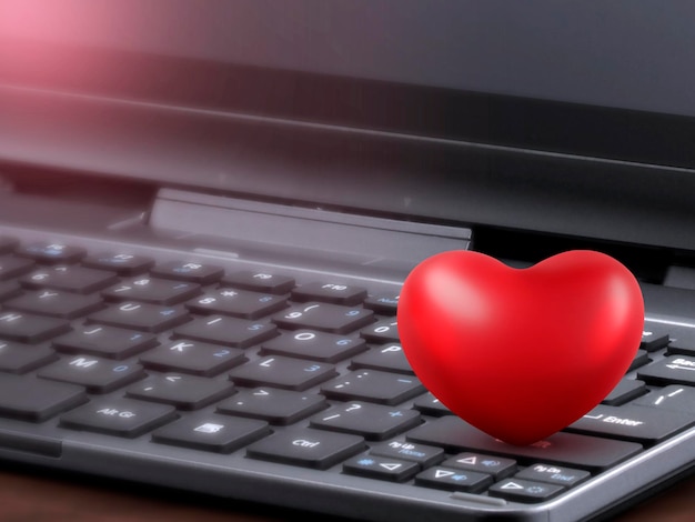 Red hearts on computer keyboard Valentine's day celebration