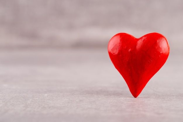 Red hearts on grey background. Valentines daz greeting cards.