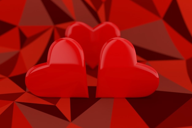 Red hearts on a low poly red background in 3d illustration