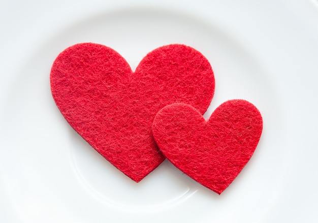 Red hearts on a plate close-up. Valentine's Day