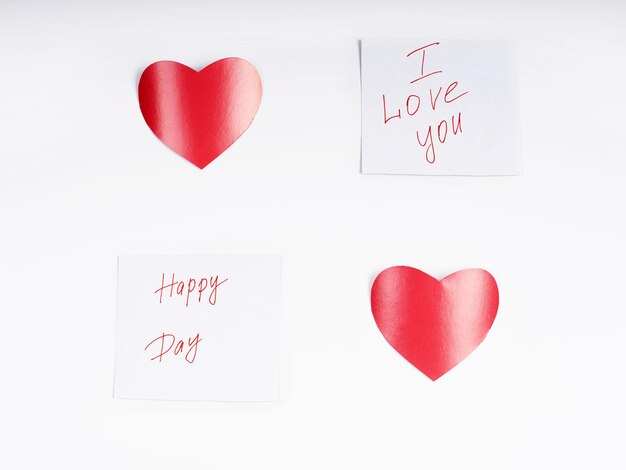 Red hearts on a white background.Postcard, congratulations. Abstract