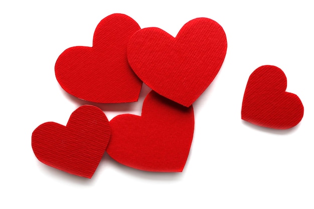 Red hearts on white paper background