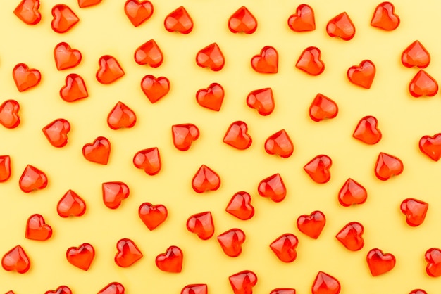 Red hearts on a yellow background