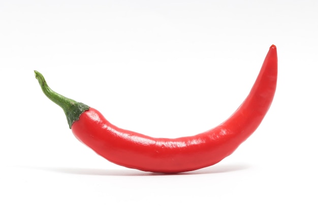 Red hot chili pepper side view isolated on white background clipping path