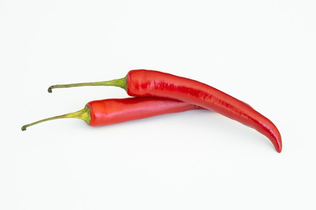 Red hot chili pepper on white background