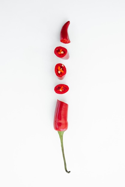 Red hot chili pepper on white background