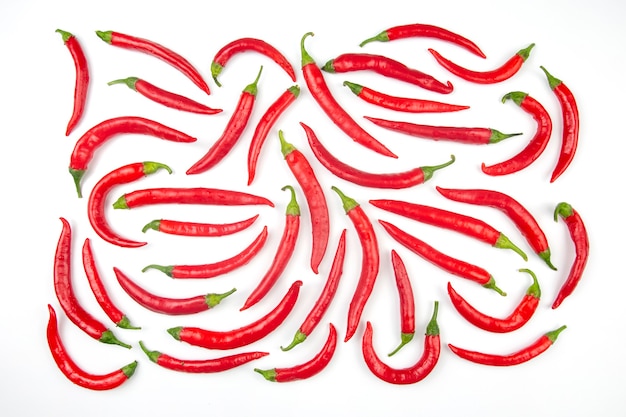 Red hot chili peppers over white background. Vitamin vegetable food