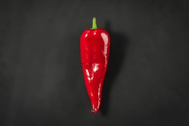 Red hot pepper on a black background