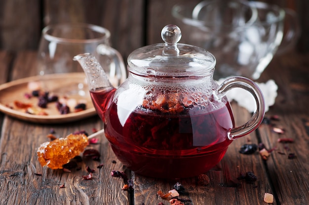 Red hot tea on the wooden table