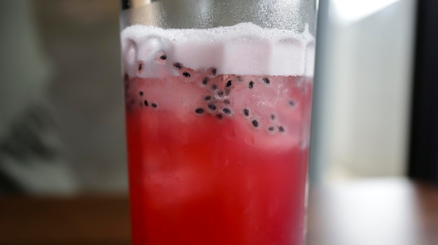 Red ice cranberry sunrise mocktail drink consist of black tea cranberry lemon mint and basil seeds