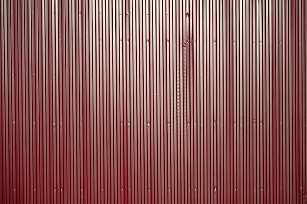 Red iron fence. Fencing of the territory. Bright background