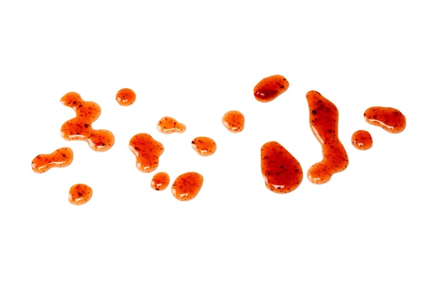 red jam splashes isolated on a white background top view