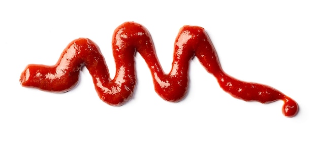 Red ketchup splash isolated on white background. tomato sauce\
abstract texture.