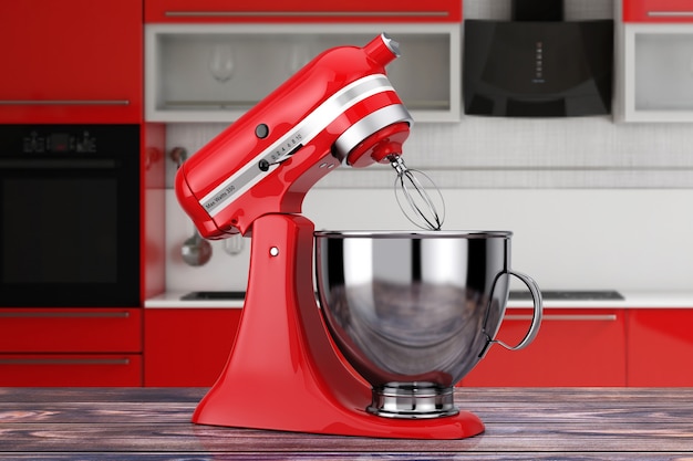 Red kitchen stand food mixer su un tavolo di legno. rendering 3d