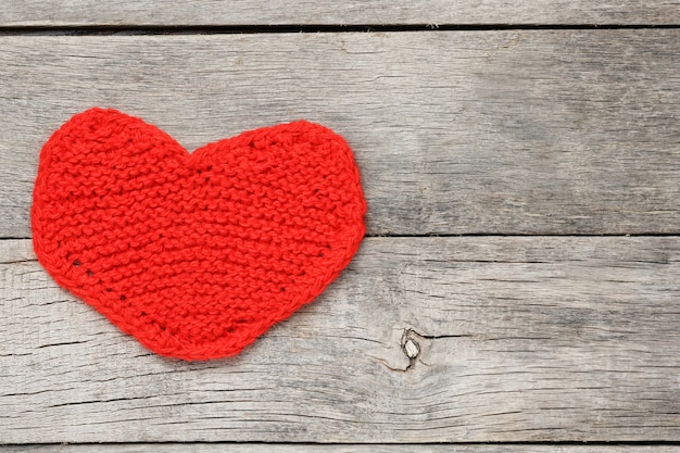 Red knitted heart, symbolizing love