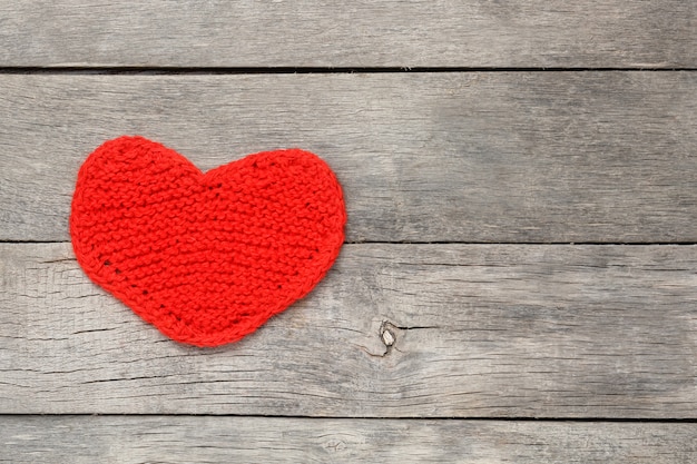 Red knitted heart, symbolizing love