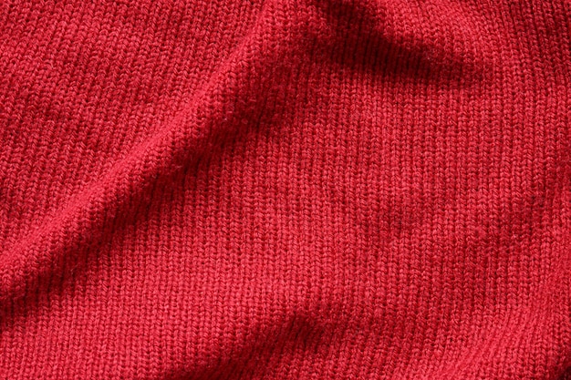 Red knitted wool texture background