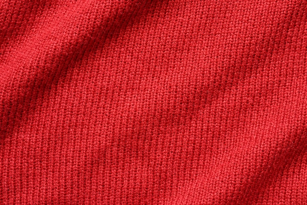 Red knitted wool texture background