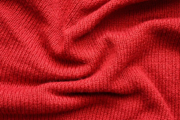 Red knitted wool texture background