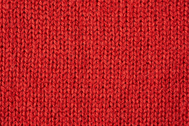 Photo red knitted wool texture background