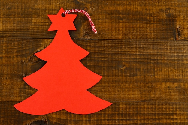 Red label on wooden background