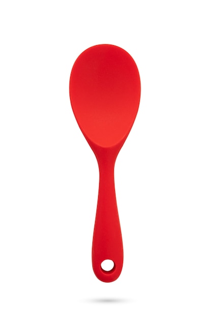 Red ladle spoon on white background
