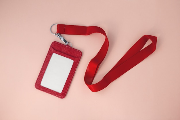 Red lanyard and leather badge