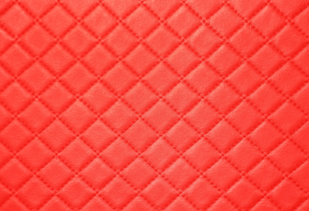 Red leather texture with seam background