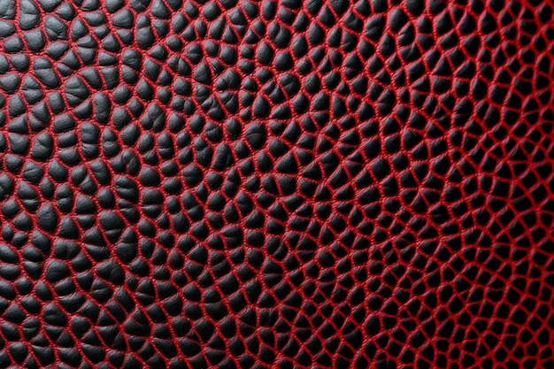 A red leather with a pattern of scales.
