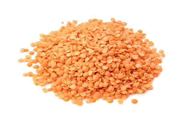 Red lentils isolated on white
