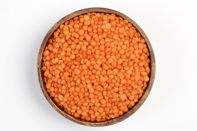 Red lentils isolated on white